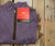 Washed Purple with Tan Duck | DownpourDRY Cotton 1/4 Zip Pullover | Water Resistance | Folded | Detail